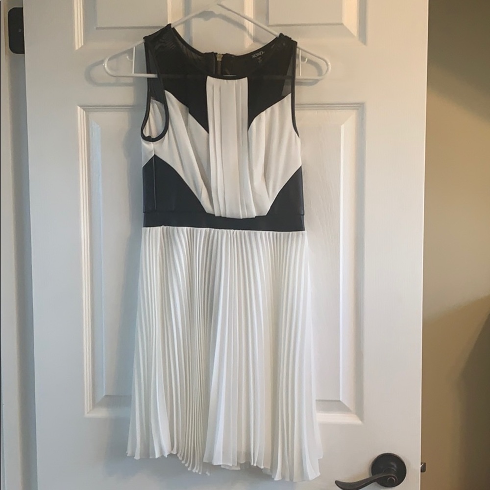 Edgy black and white pleated dress